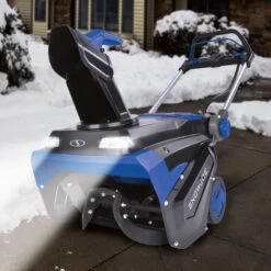 Snow Joe 24V-X4-SB21 96-Volt* MAX IONMAX Cordless Brushless Single-Stage Snow Blower | 21-inch | W/ 4 X 12.0-Ah Batteries + 2 X Dual Port Chargers -Snow Gear Shop iON100V 21SB Lifestyle05 scaled
